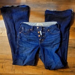 High rise button fly raw hem flare